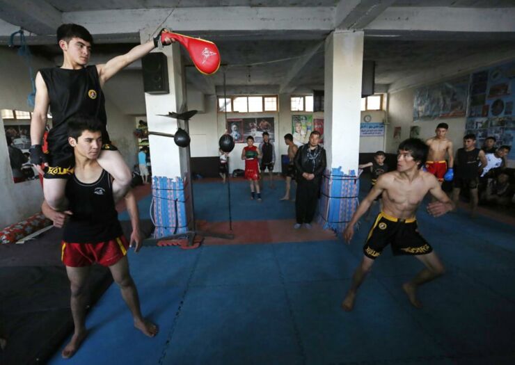 Abbas Alizada, who calls himself the Afghan Bruce Lee, works out during a media event in Kabul.