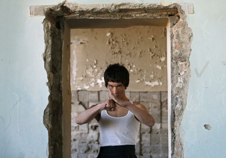 Abbas Alizada, who calls himself the Afghan Bruce Lee, poses during a media event in Kabul.