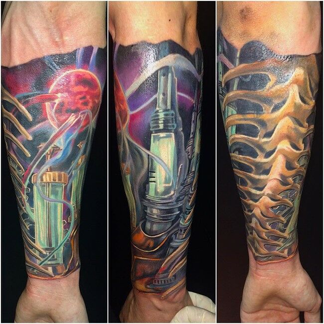 30 Biomechanical Tattoo Designs HR Giger Fans Will Adore